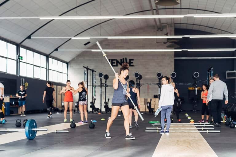 Group of people training in gym