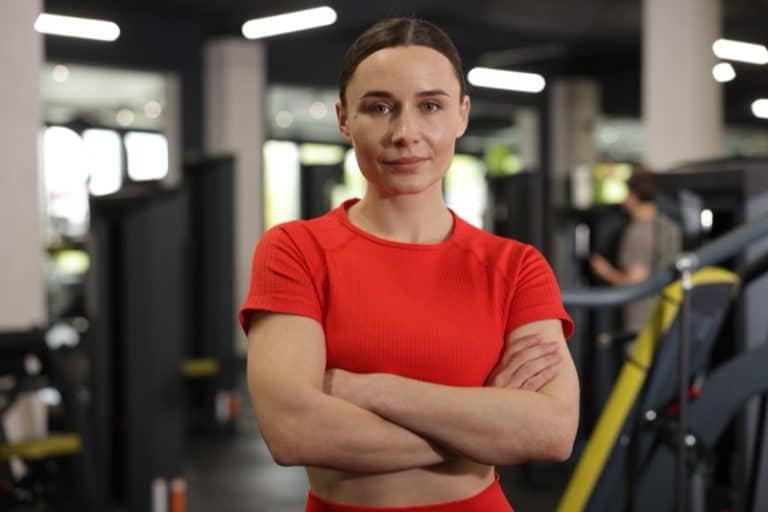 Portrait of professional personal trainer in gym